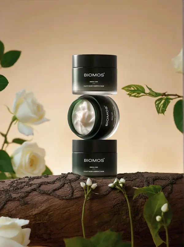 Dark green skincare jars animated in a white rose scene